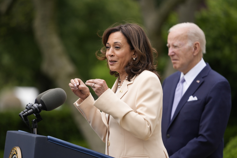 President Joe Biden listens as Vice President Kamala Harris speaks in the Rose Garden of the White House in Washington, Monday, May 1, 2023, about National Small Business Week.