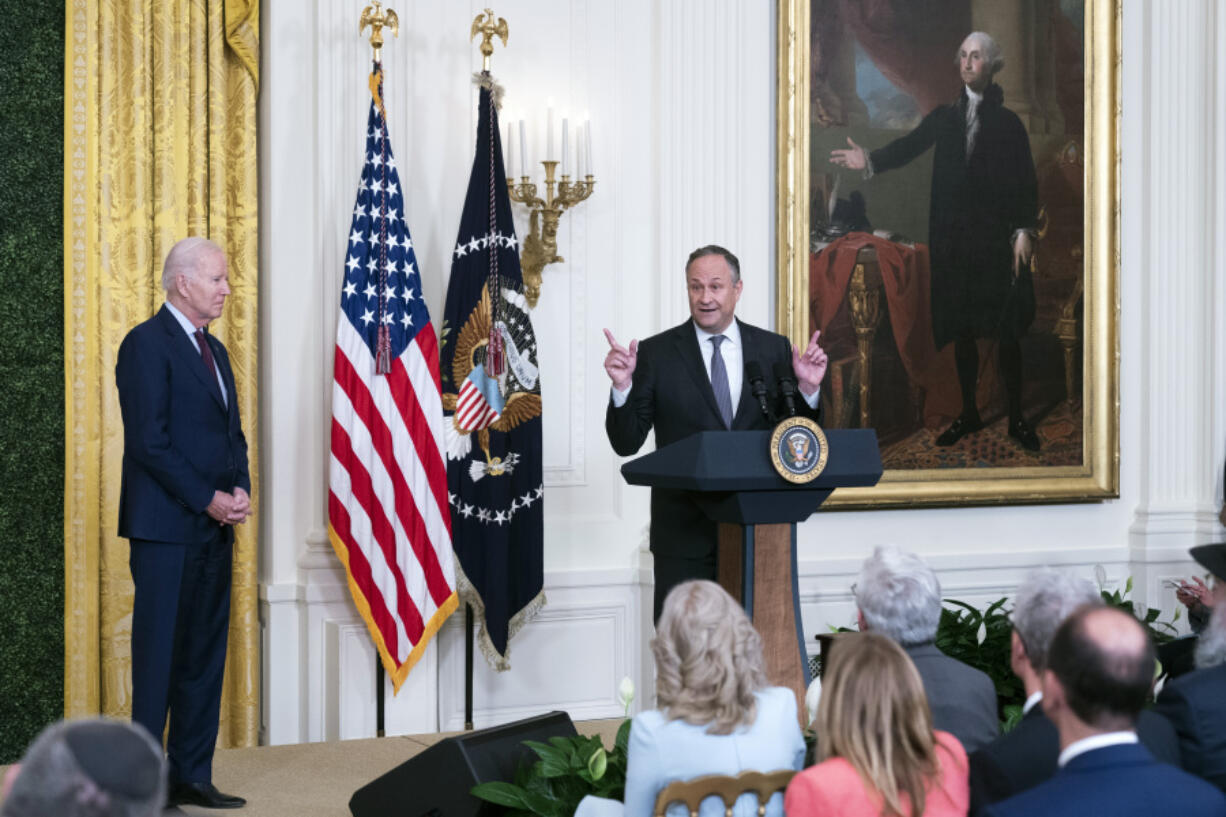 Doug Emhoff, husband of Vice President Kamala Harris, introduces President Joe Biden during the celebration of Jewish American Heritage Month in the East Room of the White House, Tuesday, May 16, 2023, in Washington.