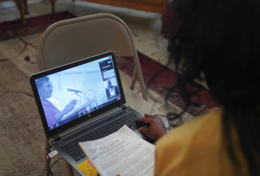 Calvernetta Williams, a long-time congregant of Zion Baptist Church, attends a virtual Sunday school class from her home in Columbia, S.C., on Sunday, April 16, 2023. Williams uses a hybrid model of attending church, Sunday school online, worship service in person, so that she can care for her husband who has Parkinson's.