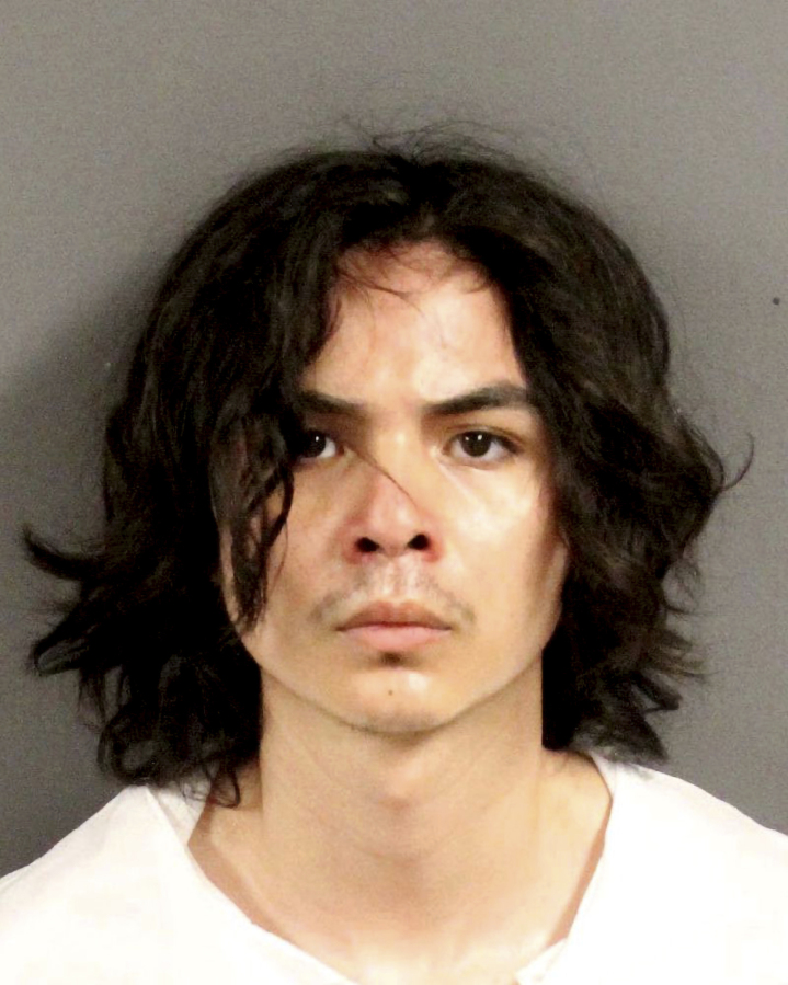 This photo provided by the Yolo County Sheriff's Department shows Carlos Dominguez, of Davis, who was arrested for the three stabbings. Police say Dominguez a 21-year-old who was a student at the University of California, Davis, until last week was arrested for allegedly committing three recent stabbings, including two that were fatal.