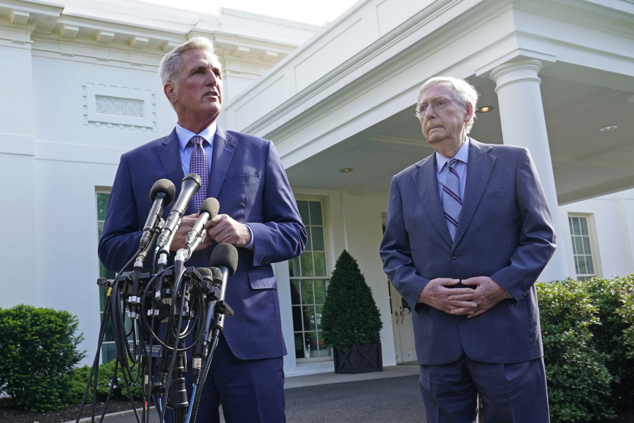 FILE - House Speaker Kevin McCarthy of Calif., left, standing next to Senate Minority Leader Mitch McConnell of Ky., right, speaks to reporters outside of the West Wing of the White House in Washington, May 9, 2023, following a meeting with President Joe Biden on the debt limit.