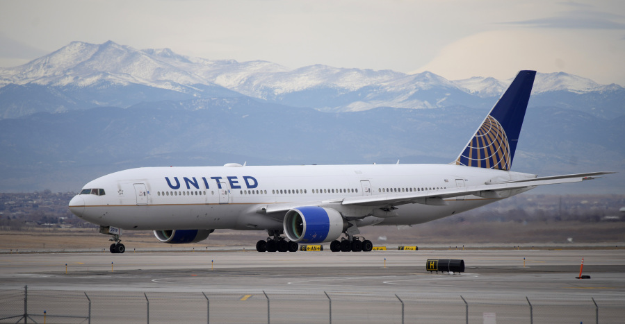 FILE - A United Airlines jetliner taxis to a runway for take off from Denver International Airport, Dec. 27, 2022.  United Airlines reports earnings on Tuesday, April 18, 2023.