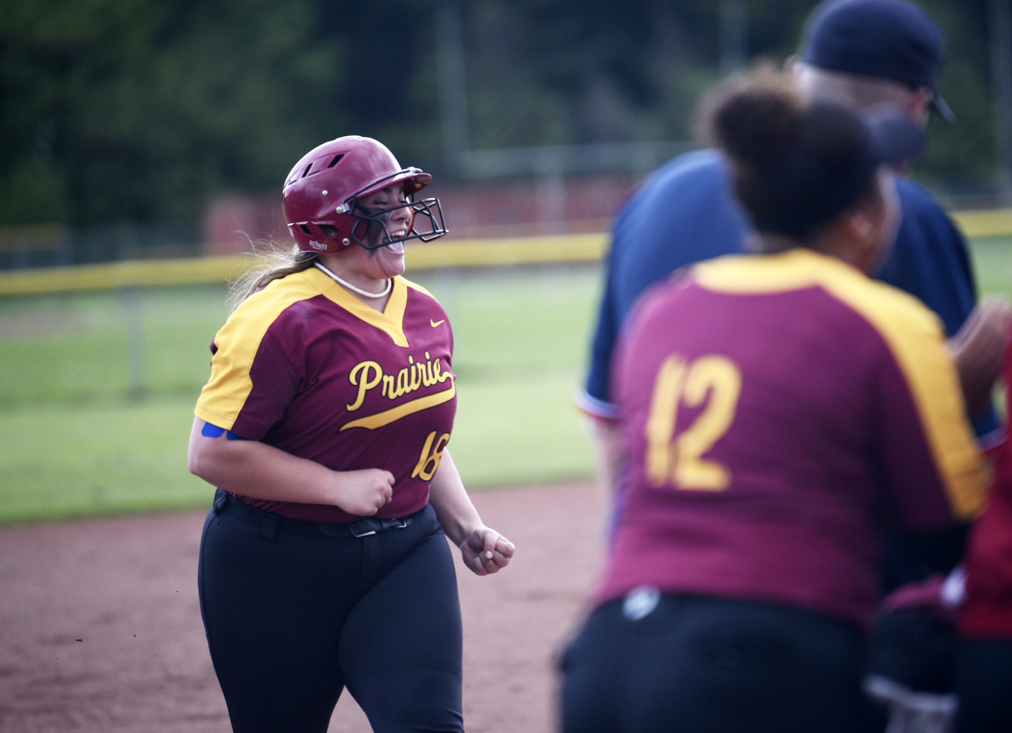 Prairie's Nae Stalcup celebrates after hitting a three-run home run during Prairie's 10-0 win over Evergreen in a 3A Greater St. Helens League softball game at Prairie on Monday, May 8, 2023.