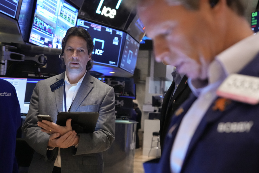 Traders work on the floor at the New York Stock Exchange in New York, Wednesday, May 3, 2023.  Stocks are drifting ahead of what Wall Street hopes will be the last hike to interest rates for a long time.