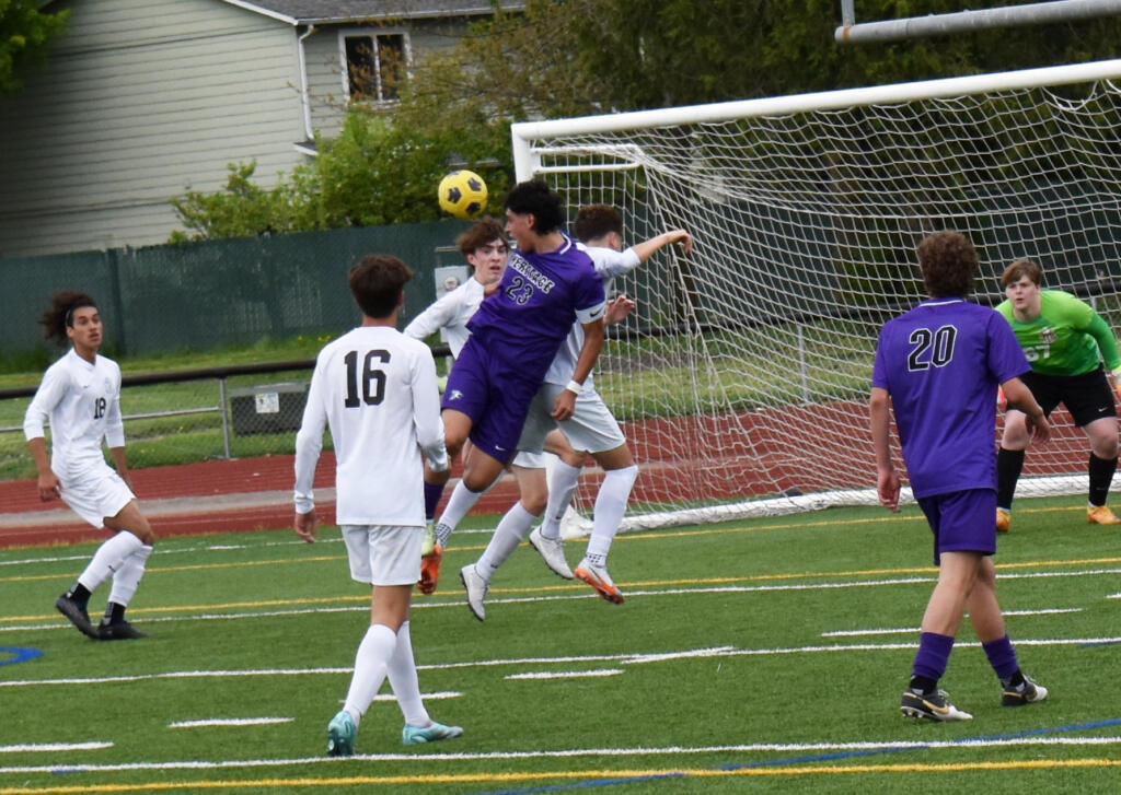 Heritage's Martin Estrada-Alvarez plays a header in front of the Central Kitsap goal during the Timberwolves' 2-1 loss to Central Kitsap in a 3A bi-district boys soccer playoff on Saturday, May 6, 2023.
