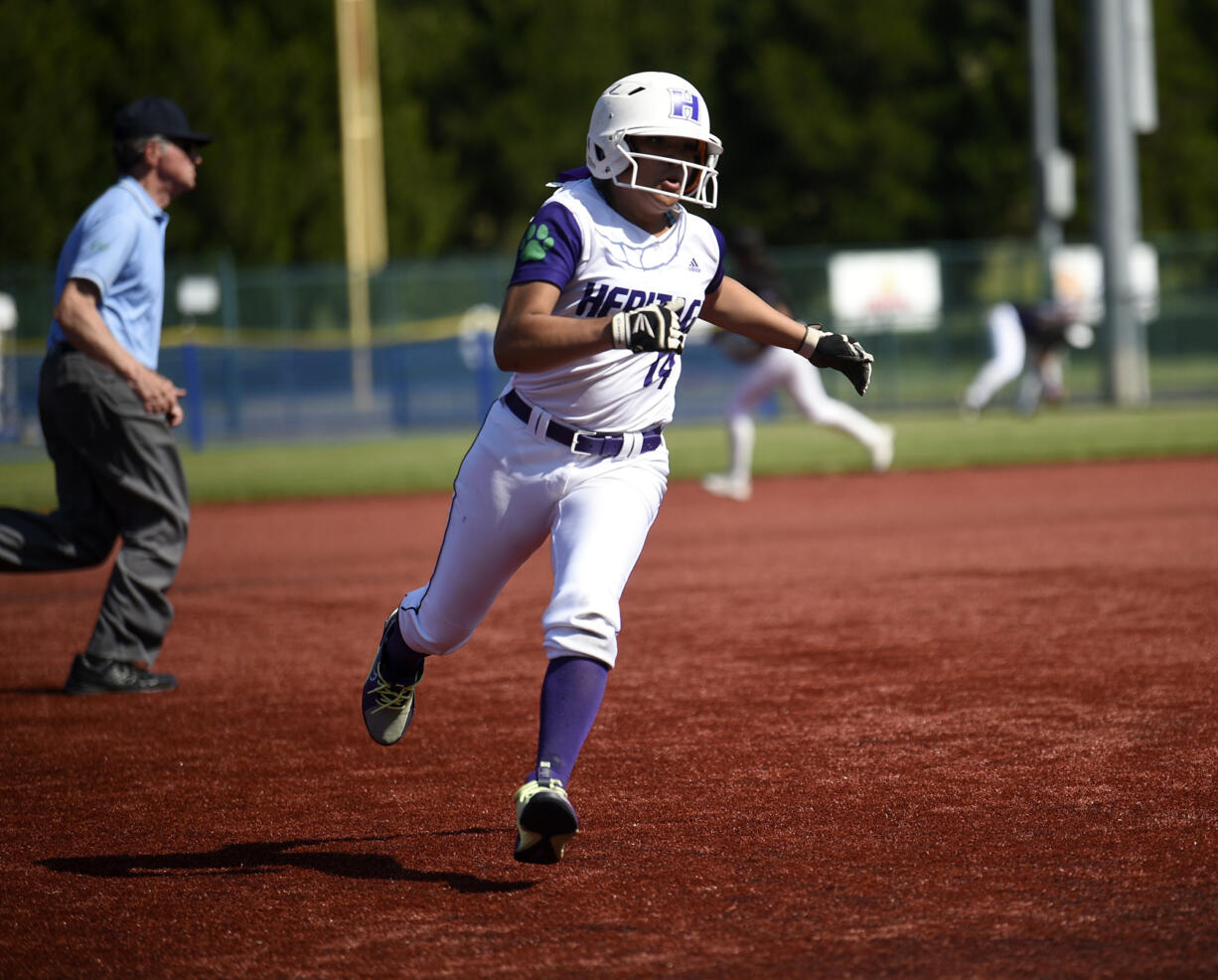 Charliana Lizama rounds third on her way to scoring a run during Heritage's 11-6 win over Garfield at the 3A state softball tournament at Regional Athletic Complex in Lacey on Thursday, May 25, 2023.