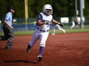 Charliana Lizama rounds third on her way to scoring a run during Heritage's 11-6 win over Garfield at the 3A state softball tournament at Regional Athletic Complex in Lacey on Thursday, May 25, 2023.