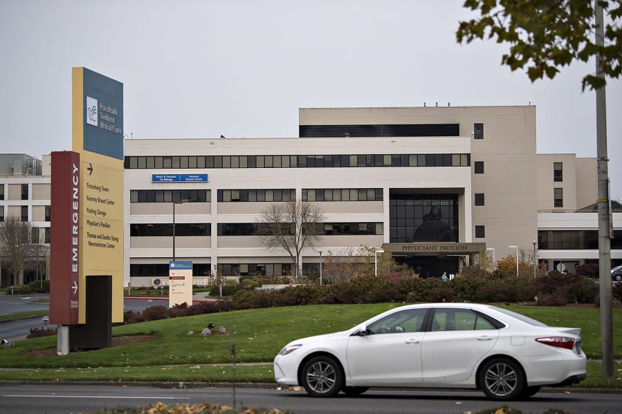 A driver passes PeaceHealth Southwest Medical Center in Vancouver. Hospitals and nursing care facilities in Clark County saw a pickup in employment in April, with health care adding 200 jobs in the month.