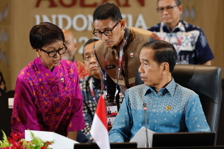Indonesian President Joko Widodo, right, talks with Foreign Minister Retno Marsudi, left, and Tourism Minister Sandiaga Uno during the 15th Indonesia-Malaysia-Thailand Growth Triangle (IMT-GT) Summit on the sidelines of the 42nd ASEAN Summit in Labuan Bajo, East Nusa Tenggara province, Indonesia, Thursday, May 11, 2023.