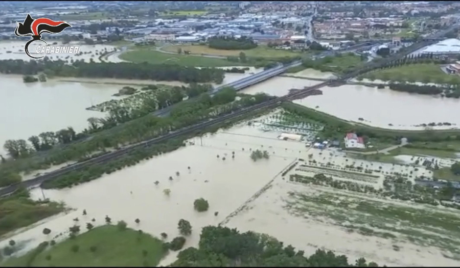 This photo provided by the Italian Carabinieri police shows flooded fields in the northern Italian region of Emilia Romagna, Wednesday, May 17, 2023. Unusually heavy rains have caused major floodings in Emilia Romagna, where trains were stopped and schools were closed in many towns while people were asked to leave the ground floors of their homes and to avoid going out.
