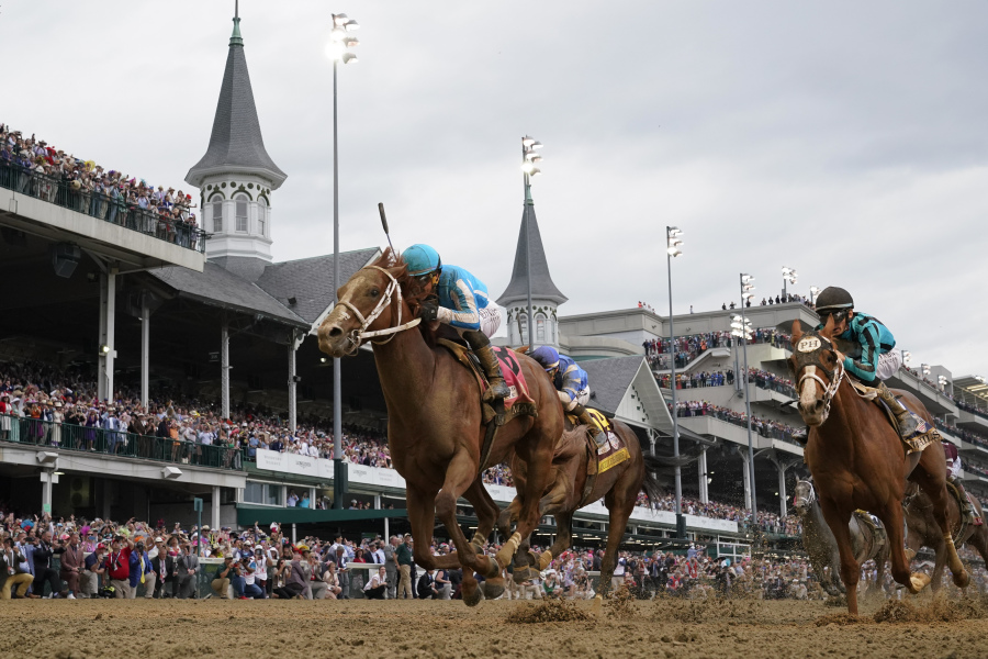 Mage (8), with Javier Castellano aboard, wins the 149th running of the Kentucky Derby horse race at Churchill Downs Saturday, May 6, 2023, in Louisville, Ky.