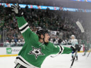 Dallas Stars' Roope Hintz celebrates after scoring against the Seattle Kraken during the first period of Game 5 of an NHL hockey Stanley Cup second-round playoff series Thursday, May 11, 2023, in Dallas.