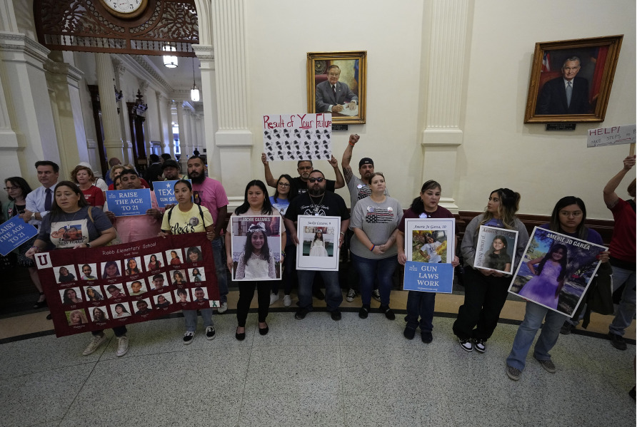 Protesters gather at the Texas State Capitol in Austin, Texas, Monday, May 8, 2023, to call for tighter regulations on gun sales. A gunman killed several people at a Dallas-area mall Saturday.