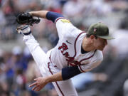 Atlanta Braves starting pitcher Jared Shuster delivers in the first inning of a baseball game against the Seattle Mariners, Sunday, May 21, 2023, in Atlanta.