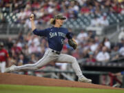 Seattle Mariners starting pitcher Bryce Miller delivers in the first inning of a baseball game against the Atlanta Braves, Friday, May 19, 2023, in Atlanta.