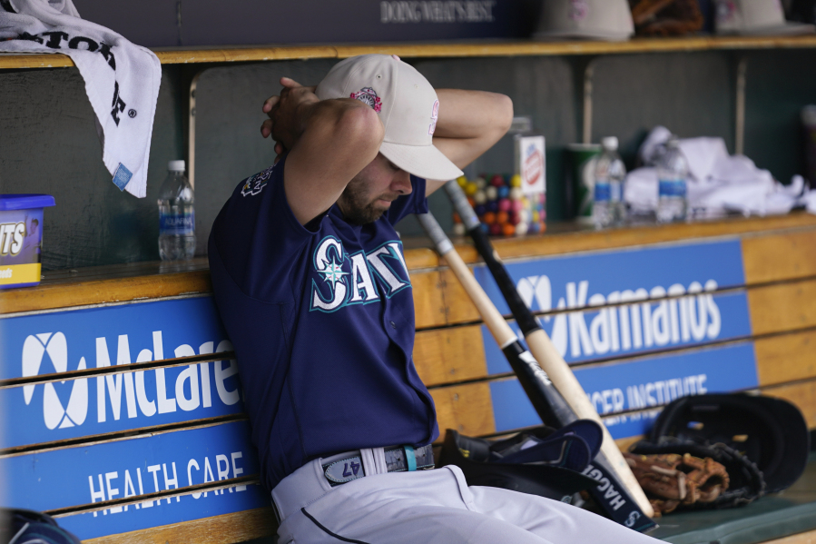 Seattle Mariners relief pitcher Matt Brash sits in the dugout after being pulled against the Detroit Tigers in the seventh inning of a baseball game, Sunday, May 14, 2023, in Detroit.