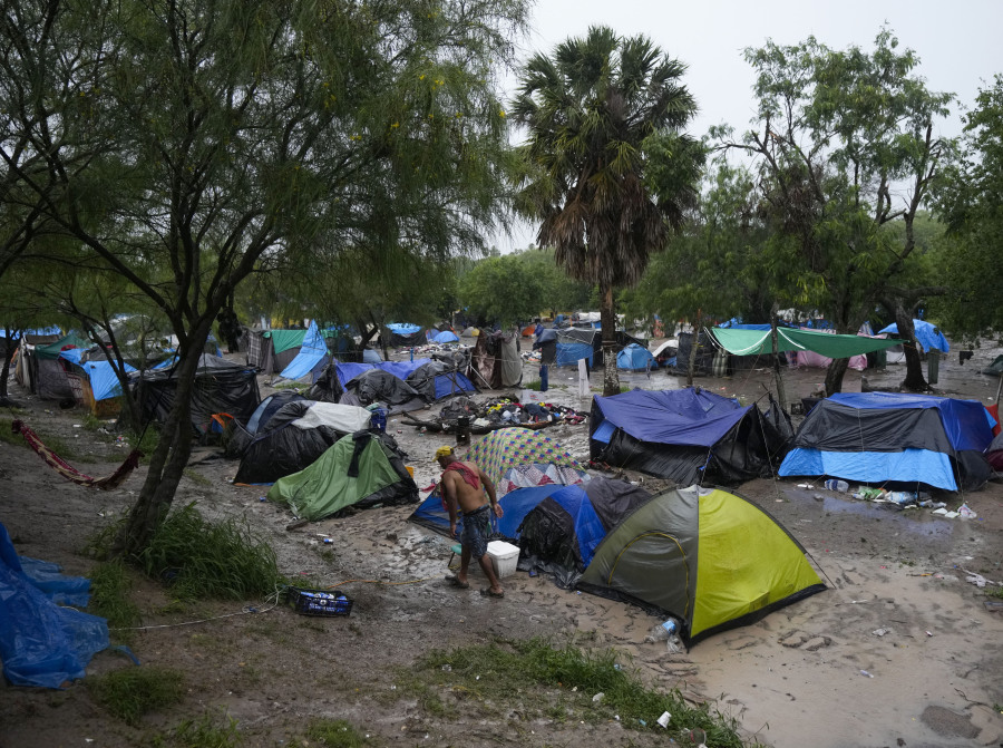 Tents are set up on the banks of the Rio Grande at a makeshift migrant camp, in Matamoros, Mexico, Saturday, May 13, 2023. As the U.S. ended its pandemic-era immigration restrictions, migrants are adapting to new asylum rules and legal pathways meant to discourage illegal crossings.