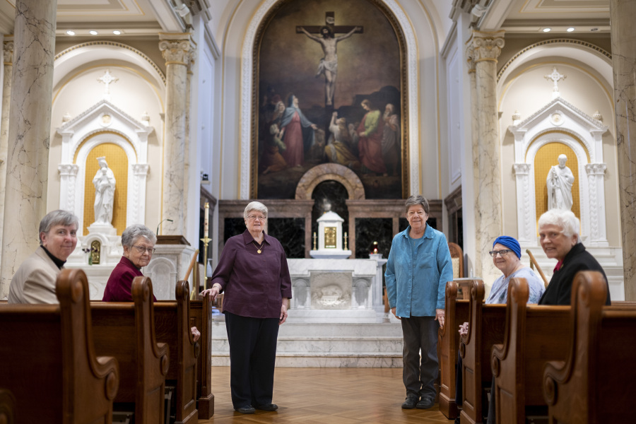 From left, Sisters Margaret M. O'Brien, Margaret Egan, Dorothy Metz, Donna Dodge, Claire E. Regan, and Sheila Brosnan, all members of the leadership council of the Sisters of Charity, pose May 2 inside the Chapel of the Immaculate Conception where they took their vows at various times, at the College of Mount Saint Vincent, a private Catholic college in the Bronx borough of New York.