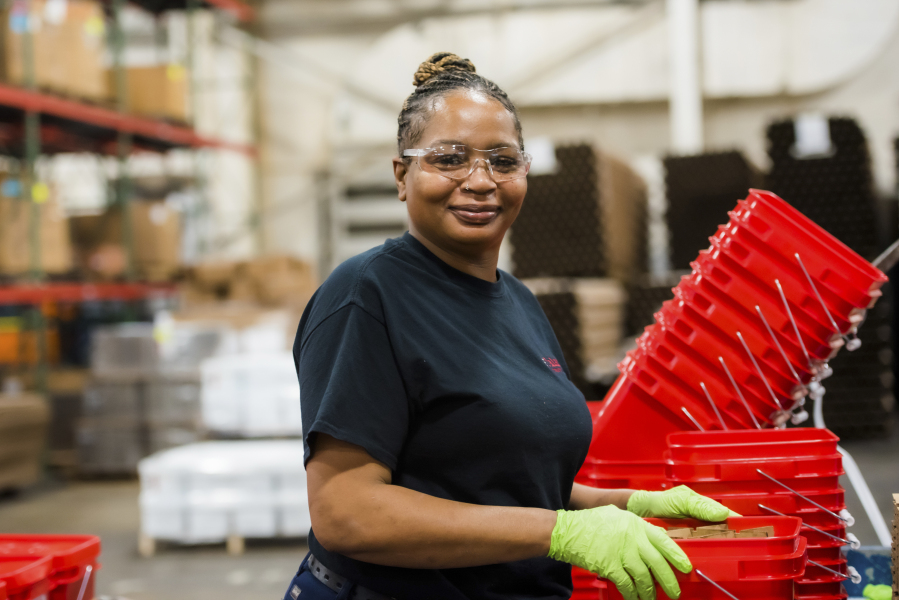 This photo provided by Towards Employment shows Mary Lamar working at Talan Products in Cleveland in 2023. She got her job through a program developed by business and community leaders -- with help from philanthropy -- to match people of color, women, and formerly incarcerated people with manufacturing jobs.