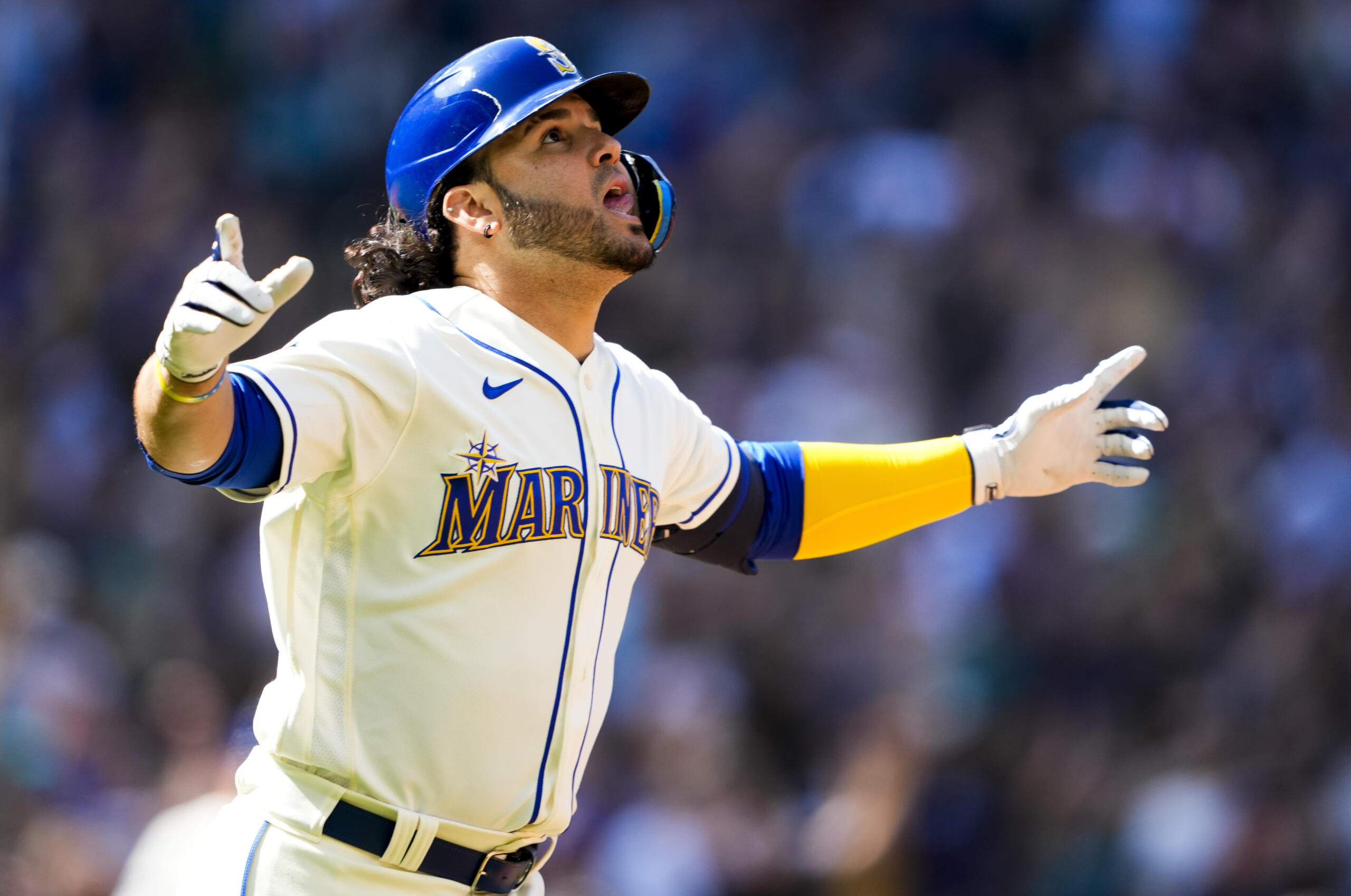 Seattle Mariners' Eugenio Suarez reacts as he runs the bases after hitting a three-run walk-off home run to win the game against the Pittsburgh Pirates during the tenth inning of a baseball game, Sunday, May 28, 2023, in Seattle. The Mariners won 6-3.