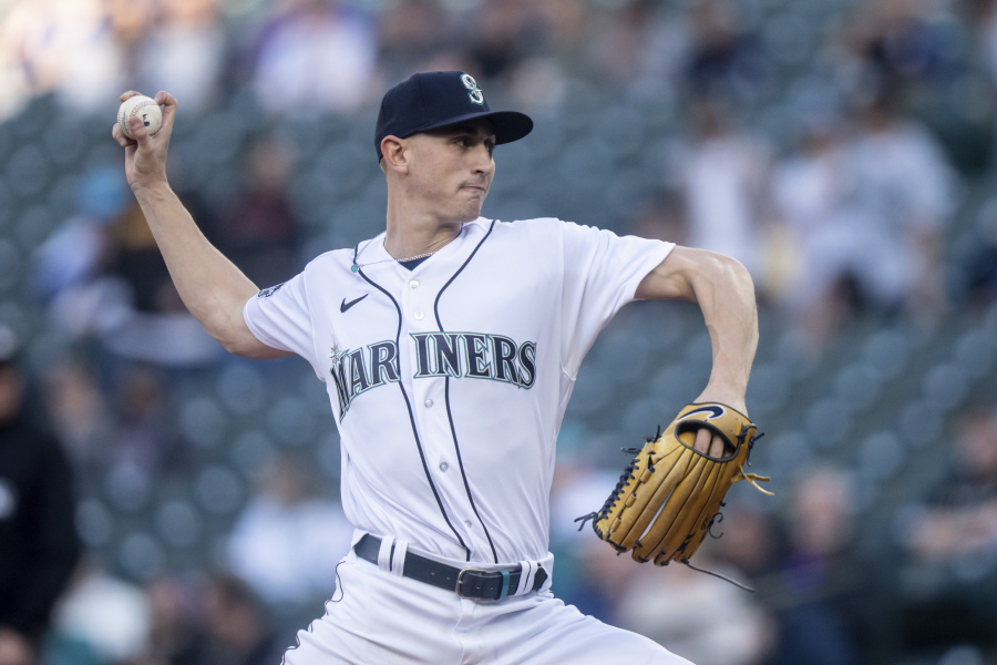 Seattle Mariners starter George Kirby delivers a pitch during the first inning of a baseball game against the Texas Rangers, Tuesday, May 9, 2023, in Seattle.