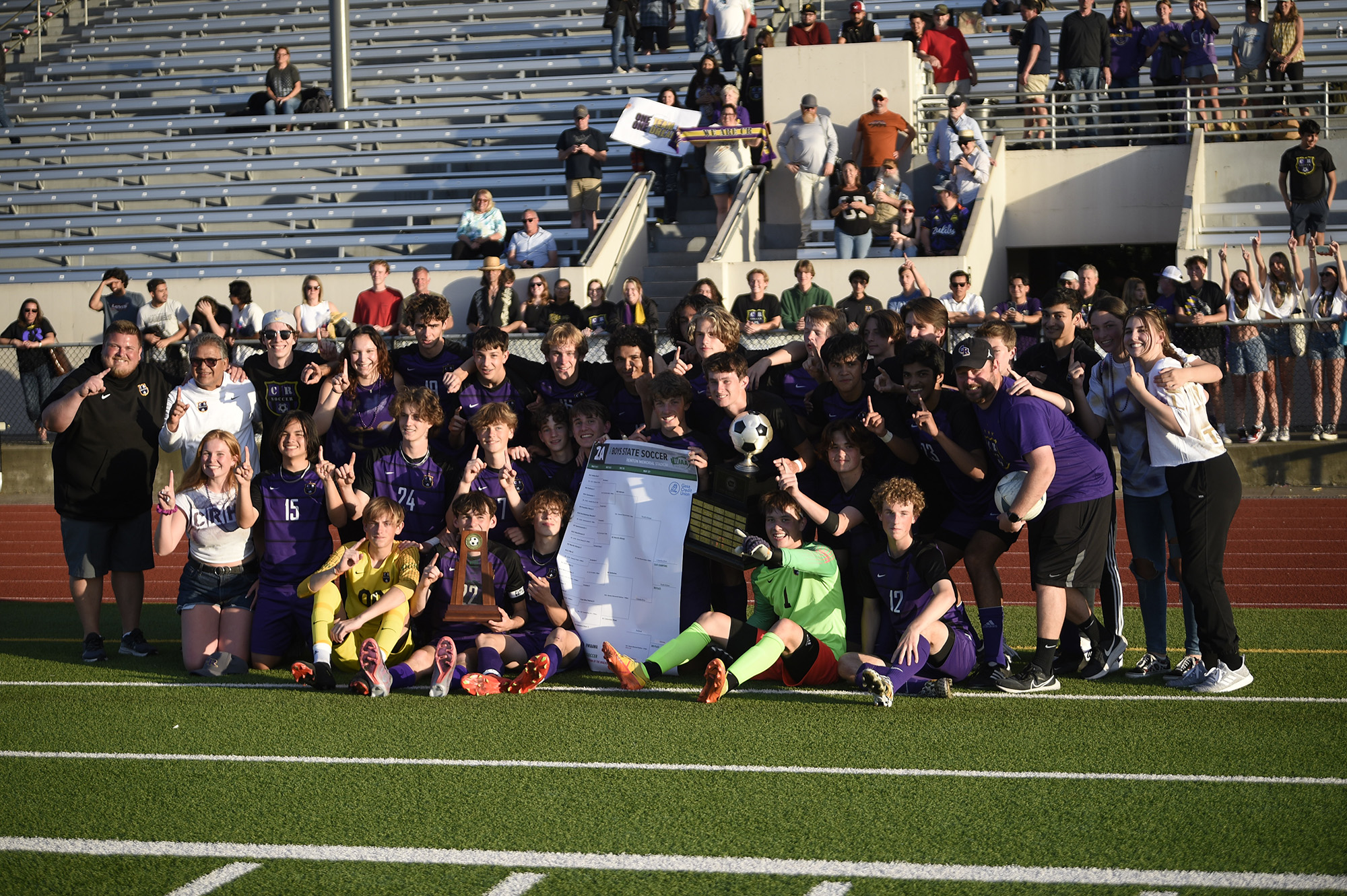 Members of the Columbia River boys soccer team pose for a team photo  after beating North Kitsap 4-2 in the Class 2A state championship match at Renton Memorial Staadium on Saturday, May 27, 2023.