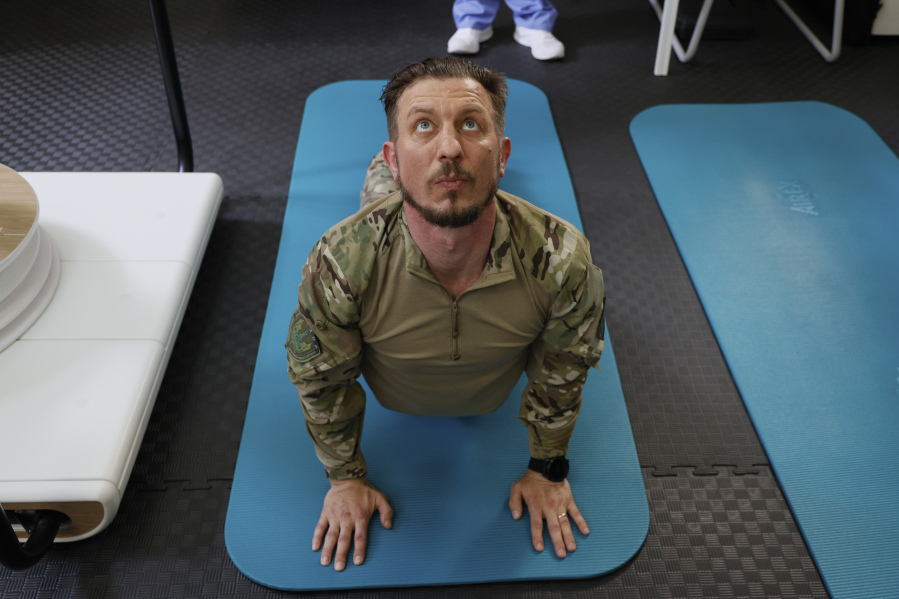 A Ukrainian serviceman doing fiscal exercises during rehabilitation session at the military hospital in Kyiv, Ukraine, on Thursday, May 5, 2023. Currently, most patients have been wounded in fighting for the eastern city of Bakhmut and elsewhere in the Donetsk area, as well as the northern and northeastern areas of Chernihiv and Sumy, which are shelled regularly. While the Ukrainian military does not provide casualty figures, some Western sources estimate more than 100,000 Ukrainian troops have been killed and wounded since Russia invaded the country.