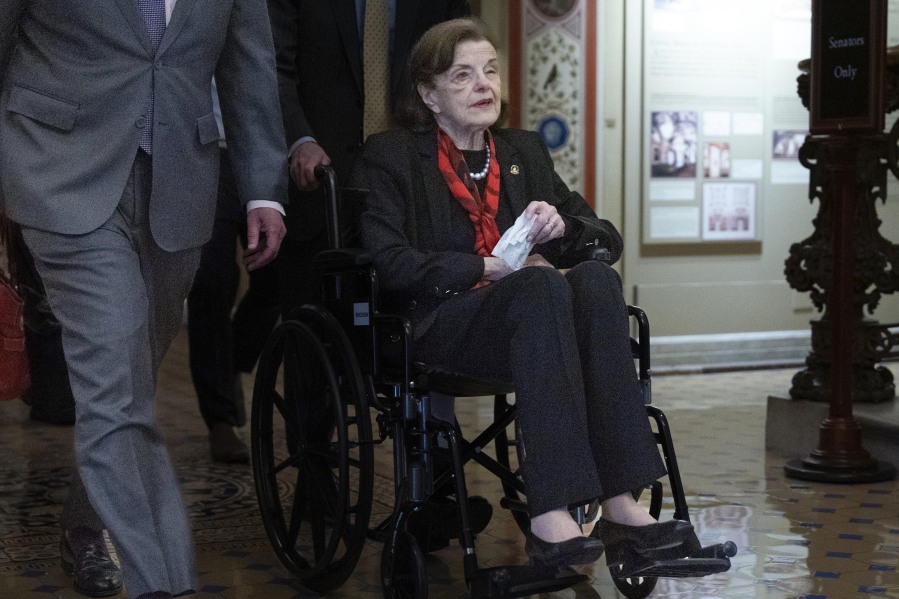 Sen. Dianne Feinstein, D-Calif., arrives in a wheelchair at the Capitol on Wednesday, May 10, 2023, in Washington.
