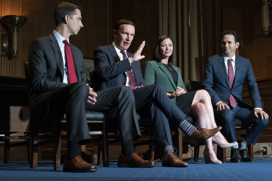 From left, Sen. Tom Cotton, R-Ark., Sen. Christopher Murphy, D-Conn., Sen. Katie Britt, R-Ala., and Sen. Brian Schatz, D-Hawaii, who have introduced legislation to protect kids on social media, are interviewed by the Associated Press, Wednesday, May 3, 2023, on Capitol Hill in Washington.