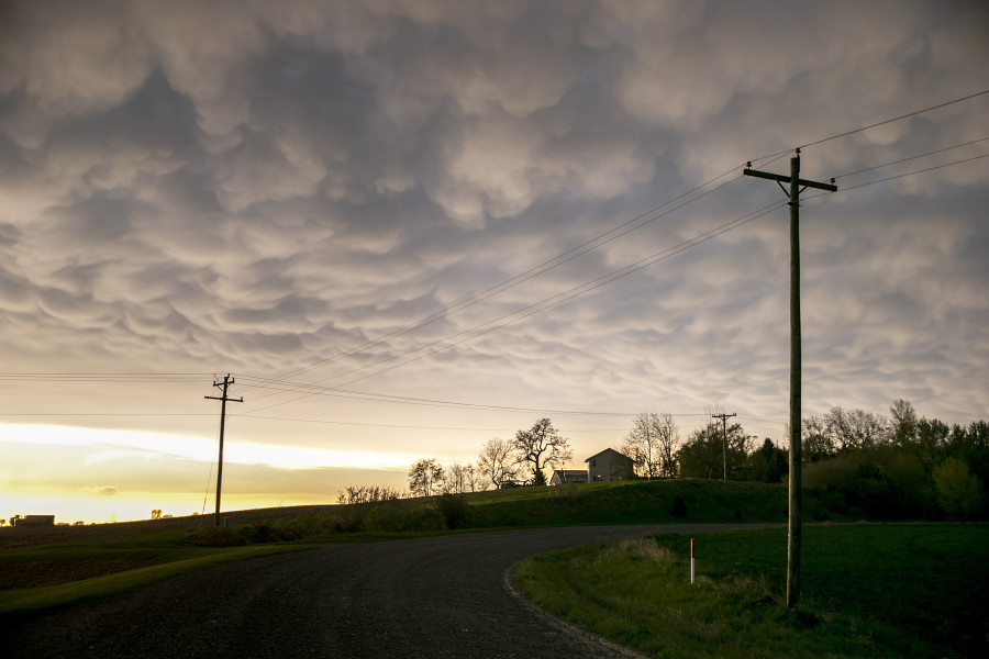 Mammatus clouds hover in the sky after a severe thunderstorm warning, Sunday, May 7, 2023, in Johnson County, Iowa.