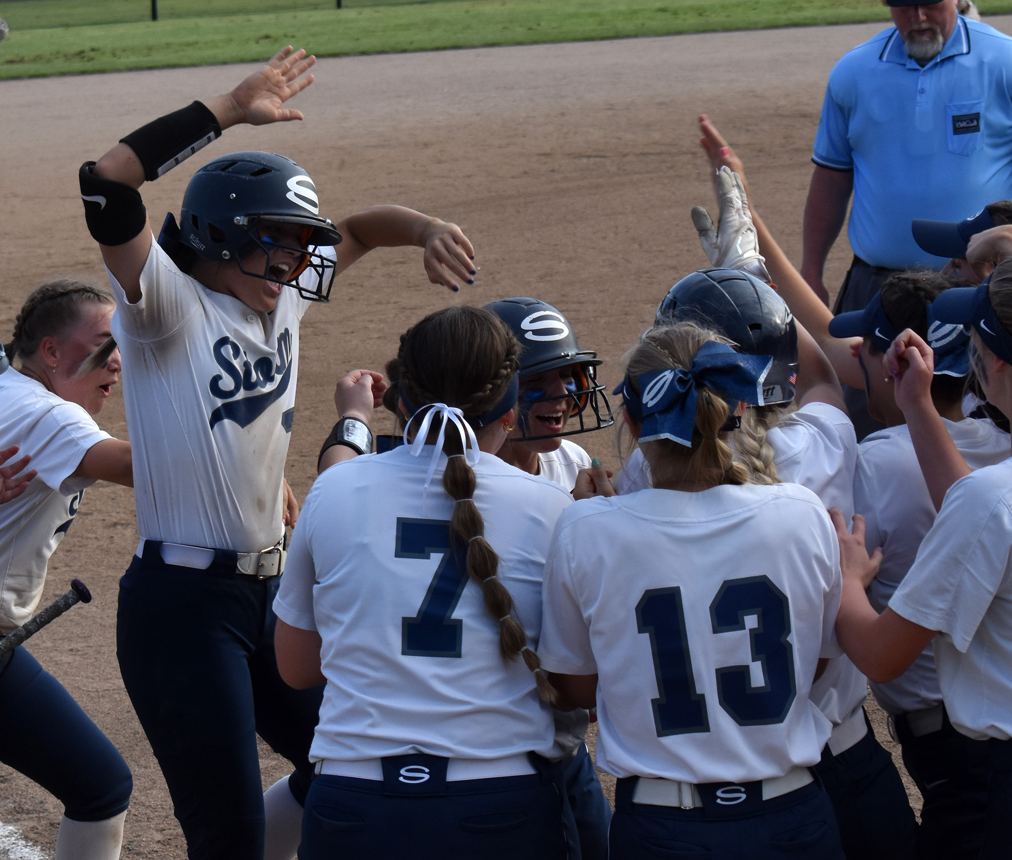 Kylie Lester (center) is greeted by her teammates after hitting a two-run home run for Skyview in an 8-4 win over Decatur in the quarterfinals Friday of the 4A bi-district softball tournament at Kent Service Fields in Kent on Friday, May 19, 2023.