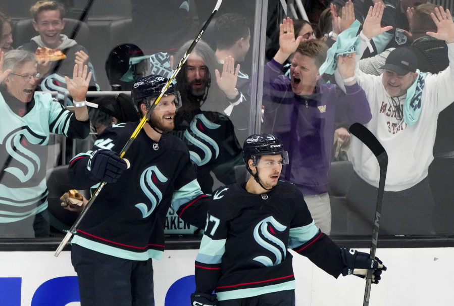 Kraken win for the 1st time in 5 games this season, beating Hurricanes 7-4, Associated Press