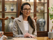This image released by Disney+ shows Michelle Yeoh in a scene from "American Born Chinese." (Carlos Lopez-Calleja/Disney+ via AP)
