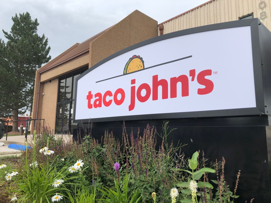 FILE - A sign stands outside the corporate headquarters of Cheyenne-based Taco John's on Aug. 1, 2019, in Cheyenne, Wyo. Declaring a mission to liberate "Taco Tuesday" for all, Taco Bell asked U.S. regulators Tuesday, May 16, 2023, to force Wyoming-based Taco John's to abandon its longstanding claim to the trademark.