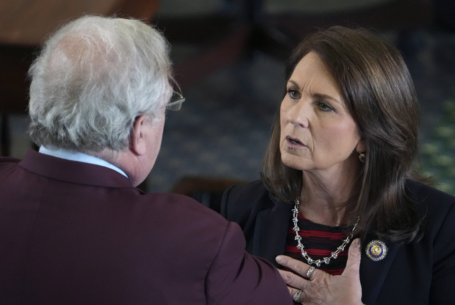 Sen. Angela Paxton, R-McKinney, talks to Sen. Paul Bettencourt, R-Houston, on the Senate Floor at the Capitol in Austin, Texas, on Thursday May 25, 2023. About two hours later, the House General Investigating Committee recommended articles of impeachment against her husband, Attorney General Ken Paxton.