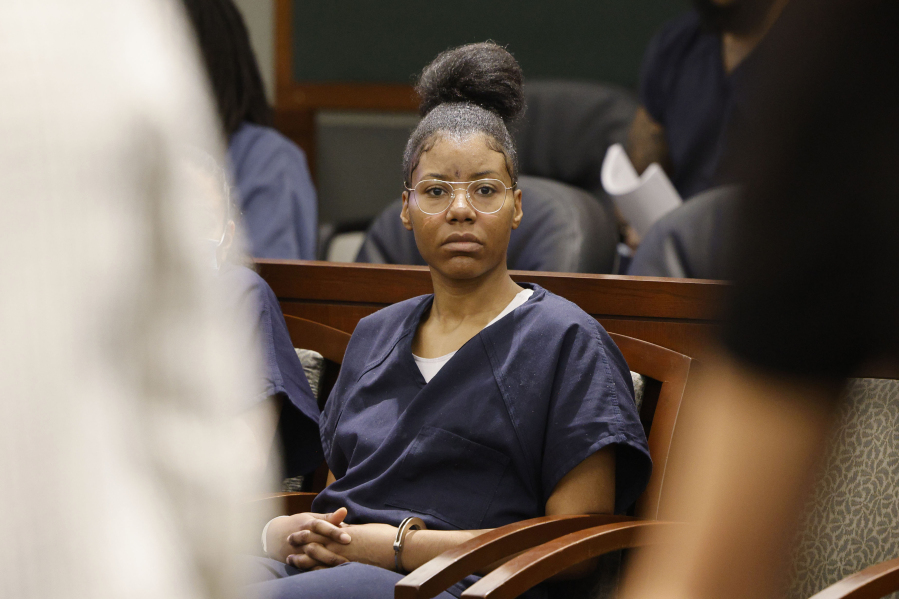 Paris Paradise Morton, 32, sits in court before a hearing on Thursday, May 18, 2023, in Las Vegas. Morton, who legally changed her name in October 2015 from Lakeisha Nicole Holloway, is accused of intentionally driving her car onto a Las Vegas Strip sidewalk in December 2015, killing one person and injuring dozens more.