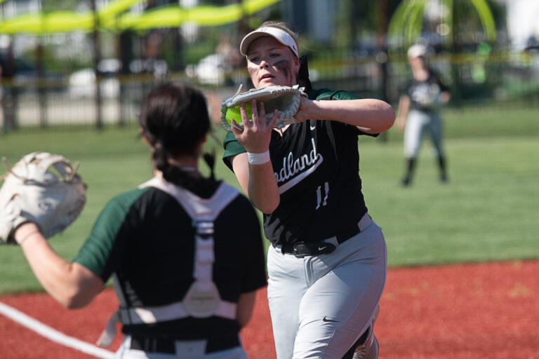 Woodland's Brynn Skelton catches a pop-up during the Beavers' 4-3 loss to Tumwater in the quarterfinals of the 2A District 4 tournament, May 18 at Rec Park in Chehalis.