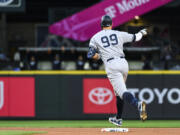 New York Yankees' Aaron Judge runs the bases after hitting a solo home run against the Seattle Mariners during the seventh inning of a baseball game Tuesday, May 30, 2023, in Seattle.