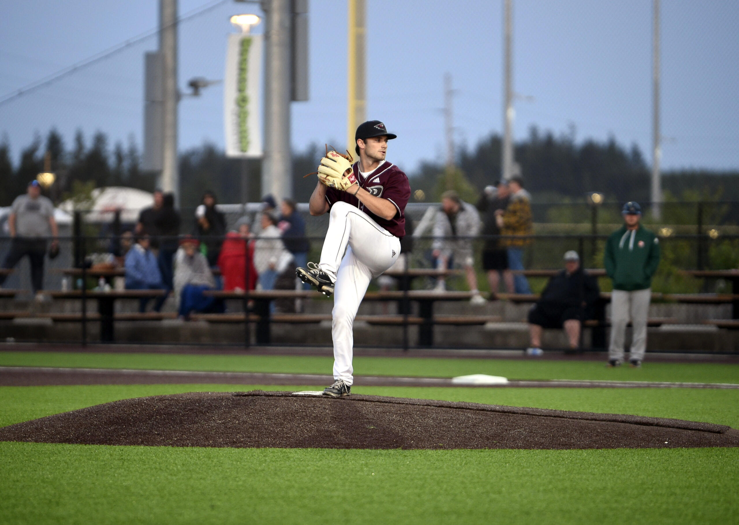 Ridgefield’s Nick Alder winds up before throwing a pitch during the Raptors’ season-opening exhibition game against the Cowlitz Black Bears on Thursday, June 1, 2023, at Ridgefield Outdoor Recreation Complex.