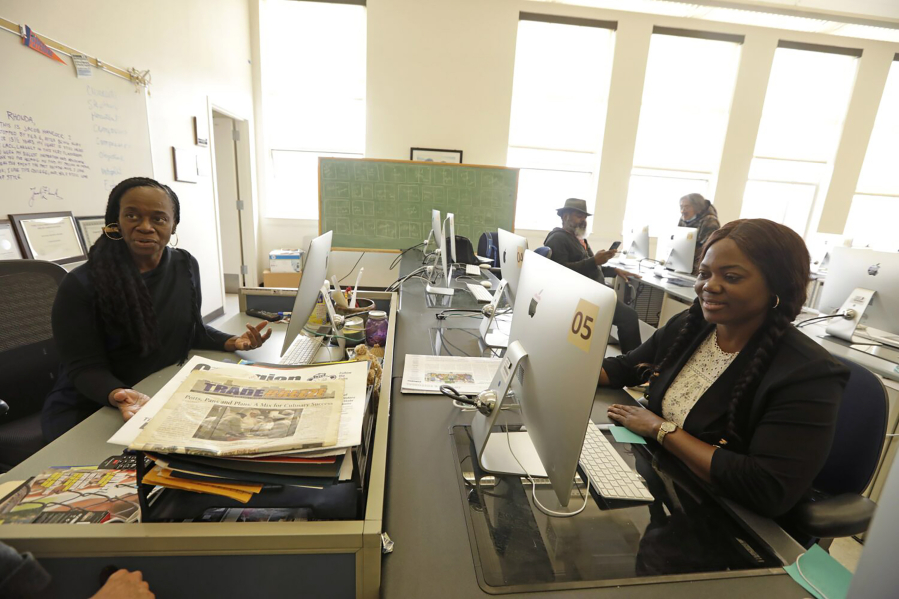 Journalism professor Rhonda Guess, left, oversees the journalism class at Los Angeles City College (LACC) as student journalist Poupy Gaelle Nguetsop participates in a journalism class on May 5, 2023. Nguetsop and other student journalists in the class have been repeatedly barred by school administrators from covering sports and music events on campus in the past year.