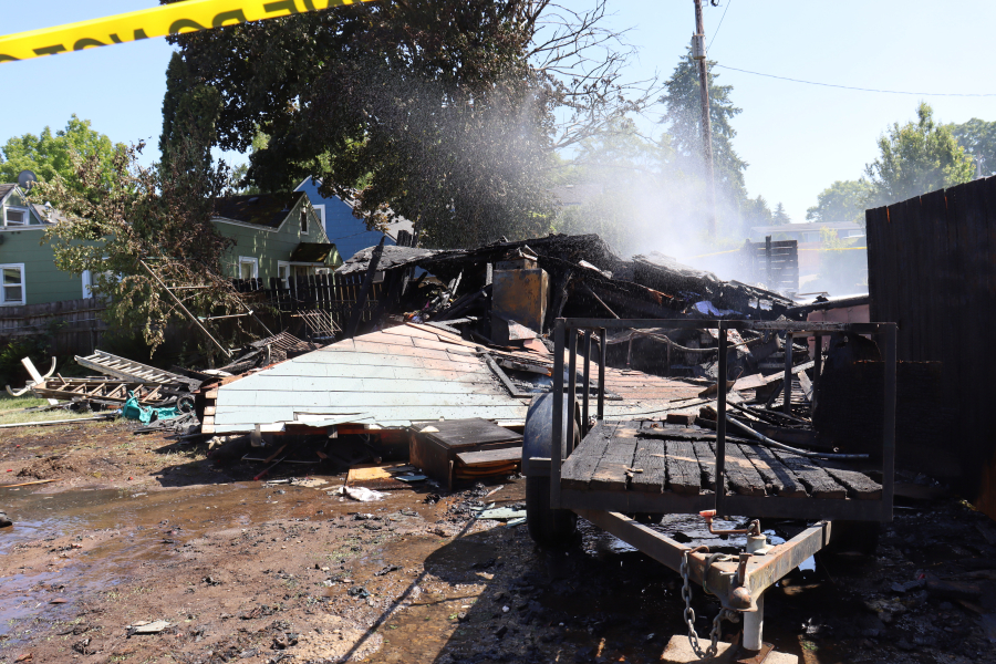 A detached garage destroyed in a fire June 2 in Vancouver's Rose Village neighborhood. The resident who was severely burned in the fire died from his injuries later that evening, according to fire officials.