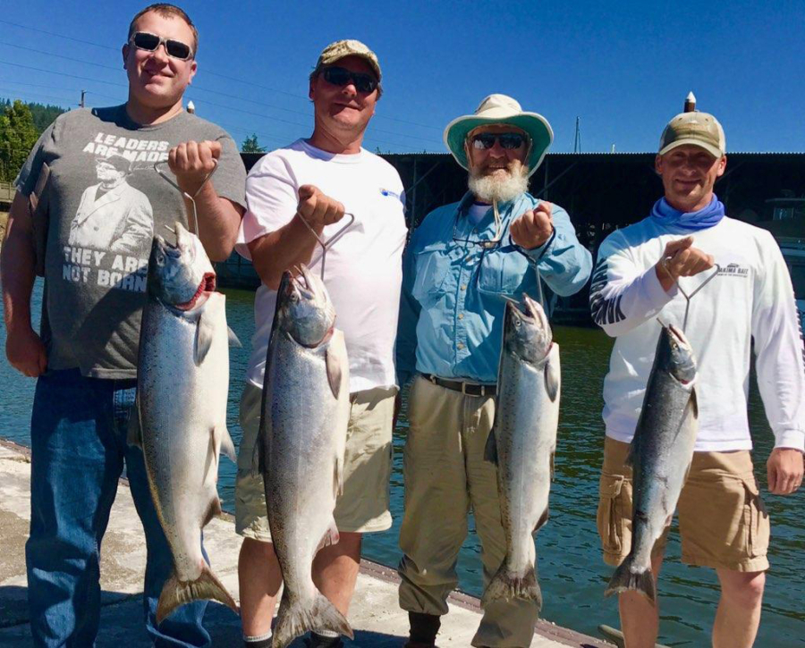 It's smiles all around for these anglers who were lucky enough to take a limit of summer Chinook while fishing with Bill Monroe Outdoors. Summer Chinook bite well when they are on the move, so stationary methods work best.