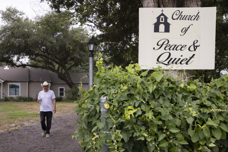 A sign for the Church of Peace & Quiet at Neil Foreman's home in Tarrant County near Mansfield, Texas.