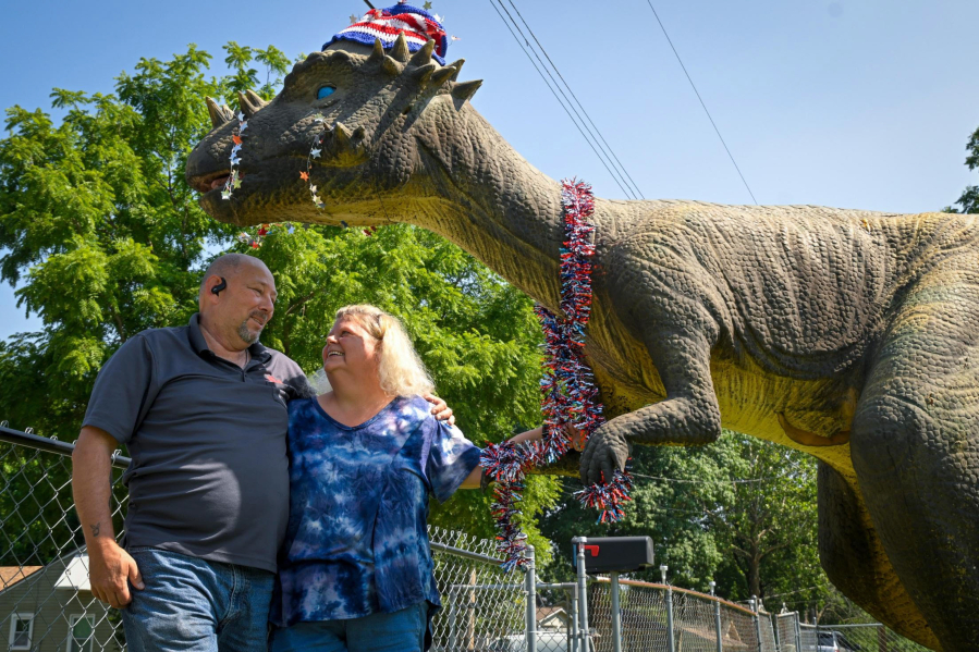 Marvin Horn and his wife, Daniyelle Finley, of Independence, Mo., are planning to move and have reluctantly put their beloved and oversized dinosaur for sale for $1,000.