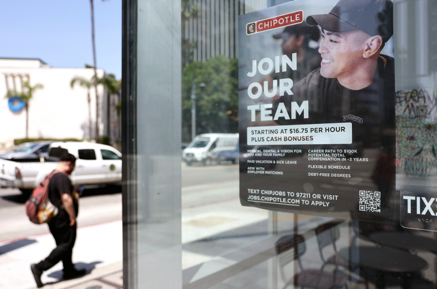 A 'Join Our Team' sign is displayed outside a Chipotle location on June 2, 2023, in Los Angeles.