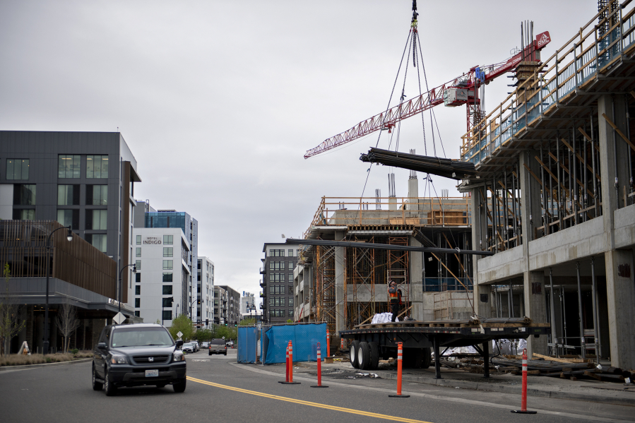 Construction continues on a new office building for ZoomInfo along the Vancouver waterfront near Columbia Way. Unlike Portland, demand for office space has been steady in Vancouver.