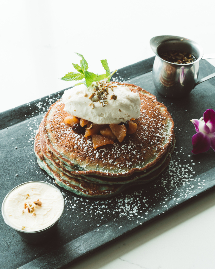 Dos Alas on the Vancouver waterfront now offers brunch, including these blue corn pancakes with apple and cherry agave compote, whipped butter and syrup.