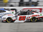 Cole Custer (00) attempts to pass Ryan Sieg (39) during a NASCAR Xfinity Series auto race at Richmond Raceway on Saturday, April 1, 2023, in Richmond, Virginia.