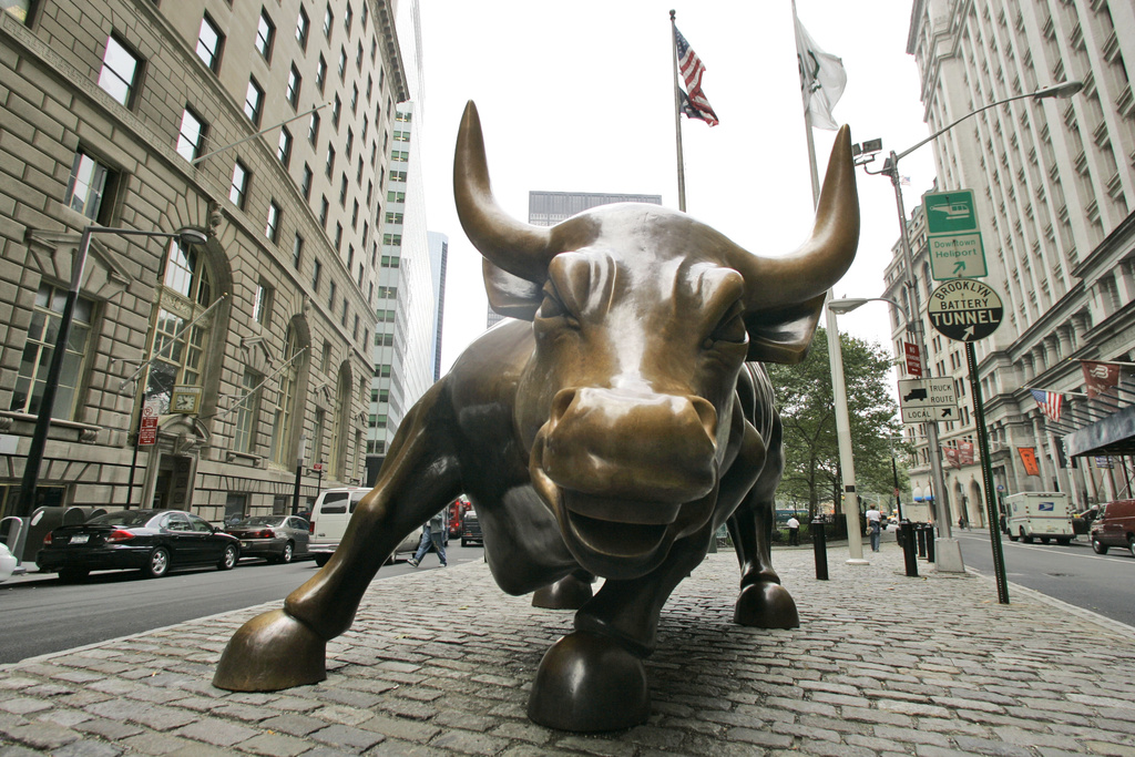 FILE- This Oct. 18, 2008 file photo shows the Charging Bull sculpture in New York City's Financial District. The S&amp;P 500 is now in what Wall Street refers to as a bull market, meaning the index has risen 20% or more from its most recent low.