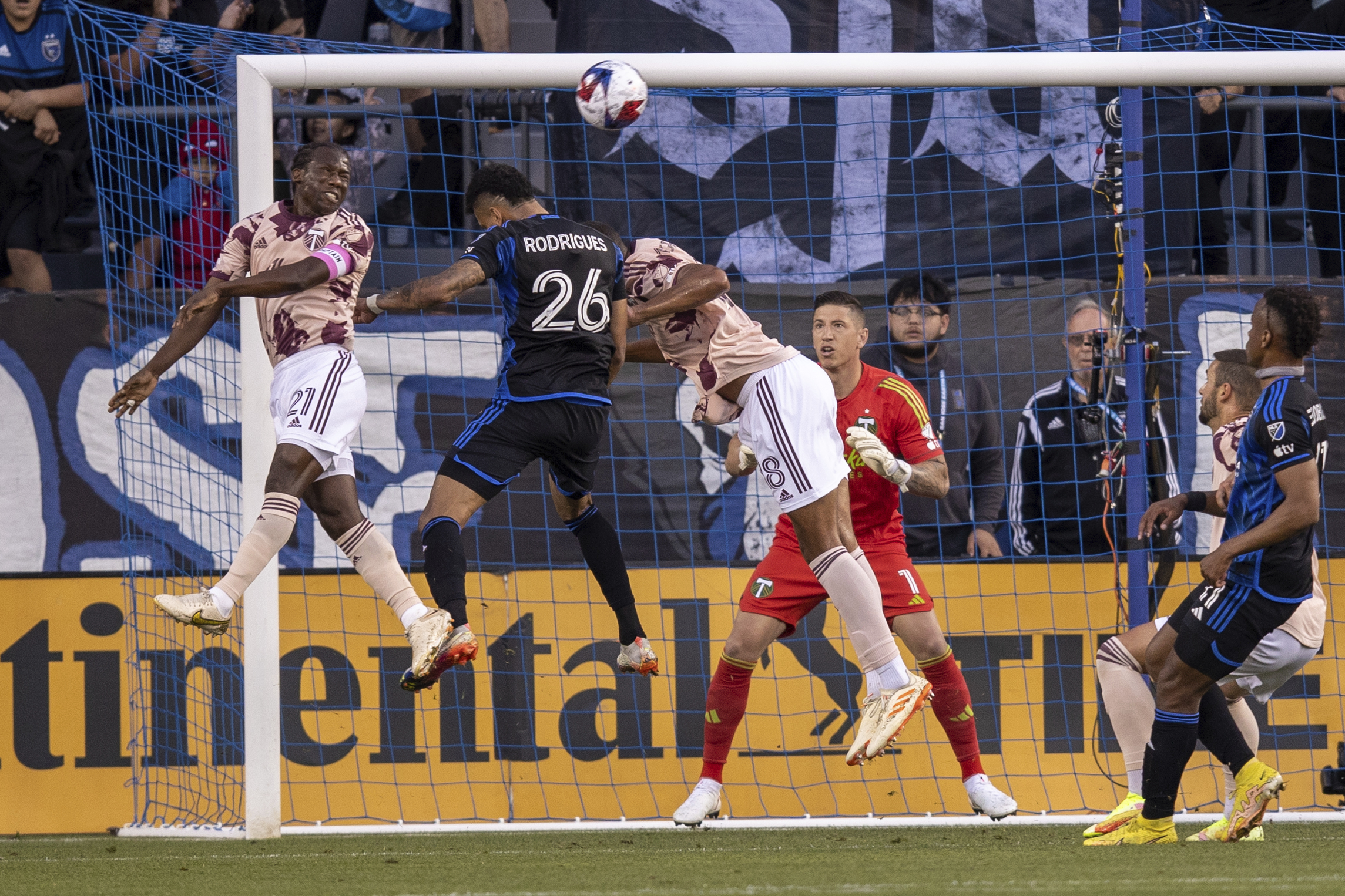Portland Timbers midfielder Diego Chará (21) and defender Zachery McGraw (18) defend against a header by San Jose Earthquakes defender Rodrigues (26) during the first half of an MLS soccer match in San Jose, Calif., Saturday, June 17, 2023.
